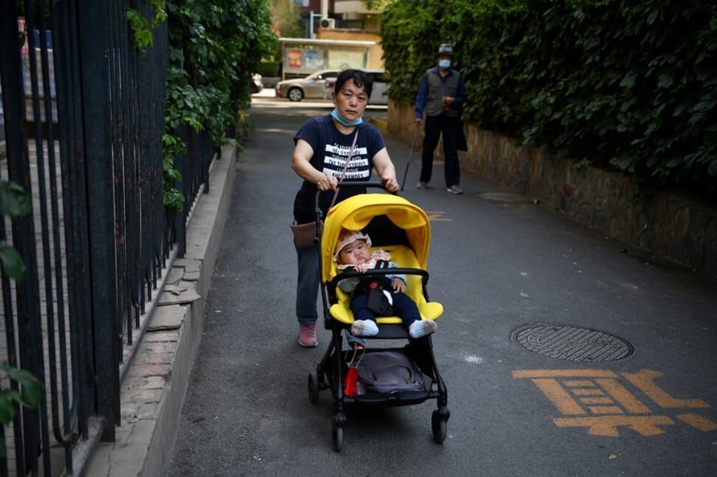 As the cost of raising a child rises, many Chinese people are delaying having children. Photo: AFP As the cost of raising a child rises, many Chinese people are delaying having children. Photo: AFP