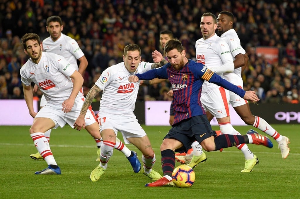 Barcelona's Argentinian forward Lionel Messi scores against SD Eibar at the Camp Nou in January, 2019. Photo: AFP