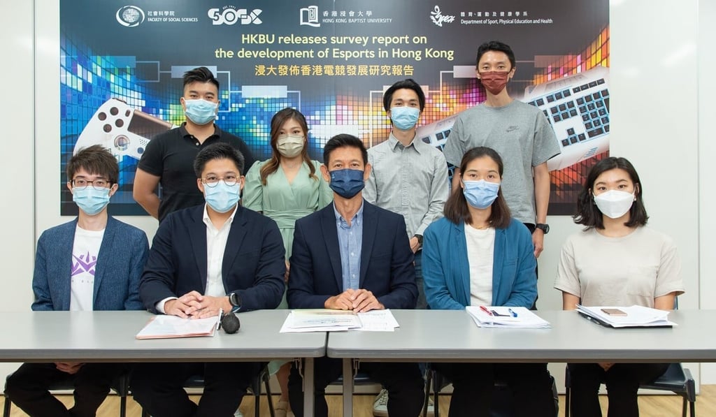 Baptist University associate dean (development) of the Faculty of Social Sciences Chung Pak-kwong (front, centre) and research team members Dr Leung Ka-man (front, second right) and Claudia Wong Ming-yu (front, right) with chairman of the Asian Electronic Sports Federation Kenneth Fok Kai-kong (front, second left), and industry representatives Aaron Ho Ho-nam (front, left), Alex Tang (back, left), Syreni Shek Hoi-yee (back, second left), William Ching Ting-lam (back, second right) and Lam Wing (back, right) at the survey report press conference. Photo: Baptist University Baptist University associate dean (development) of the Faculty of Social Sciences Chung Pak-kwong (front, centre) and research team members Dr Leung Ka-man (front, second right) and Claudia Wong Ming-yu (front, right) with chairman of the Asian Electronic Sports Federation Kenneth Fok Kai-kong (front, second left), and industry representatives Aaron Ho Ho-nam (front, left), Alex Tang (back, left), Syreni Shek Hoi-yee (back, second left), William Ching Ting-lam (back, second right) and Lam Wing (back, right) at the survey report press conference. Photo: Baptist University