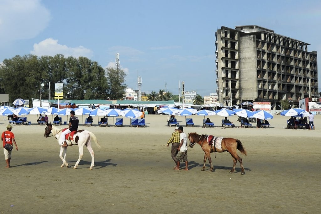 A tourist rides a horse on Cox’s Bazar Beach on October 10, 2020. Photo: AFP A tourist rides a horse on Cox’s Bazar Beach on October 10, 2020. Photo: AFP