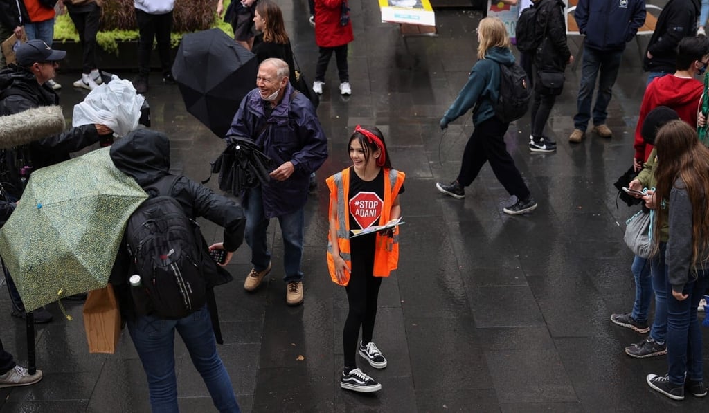 Izzy Raj-Seppings, centre, helps organise a “School Strike 4 Climate” rally to demand action on climate change in Sydney on May 21. Photo: Reuters Izzy Raj-Seppings, centre, helps organise a “School Strike 4 Climate” rally to demand action on climate change in Sydney on May 21. Photo: Reuters