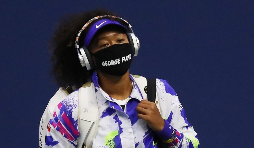 Osaka walks onto the court at the 2020 US Open wearing a mask with the name of George Floyd. Photo: TNS
