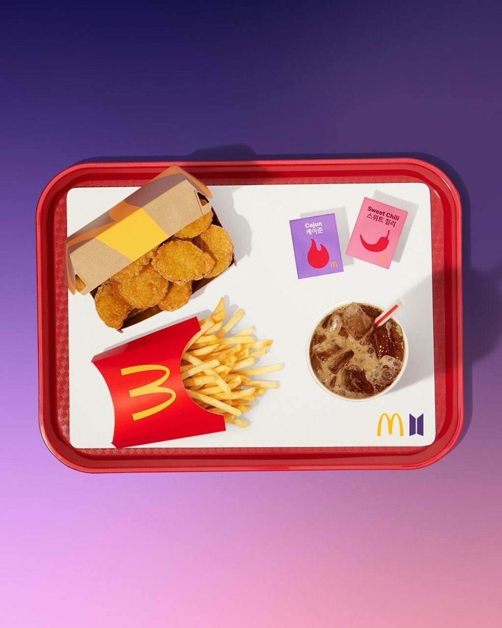 The meal features fries, nine chicken nuggets, a Coca-Cola drink and two special new sauces – Cajun and Sweet Chili. Photo: McDonald’s The meal features fries, nine chicken nuggets, a Coca-Cola drink and two special new sauces – Cajun and Sweet Chili. Photo: McDonald’s