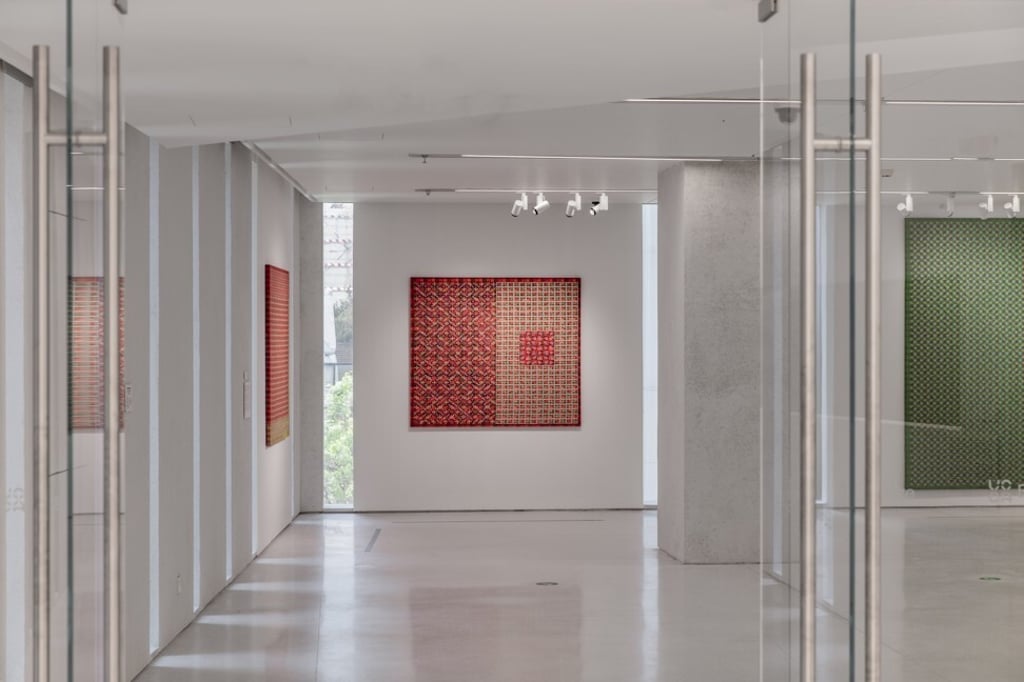 Ding Yi, Appearance of Crosses 2000. Photo: UCCA Centre