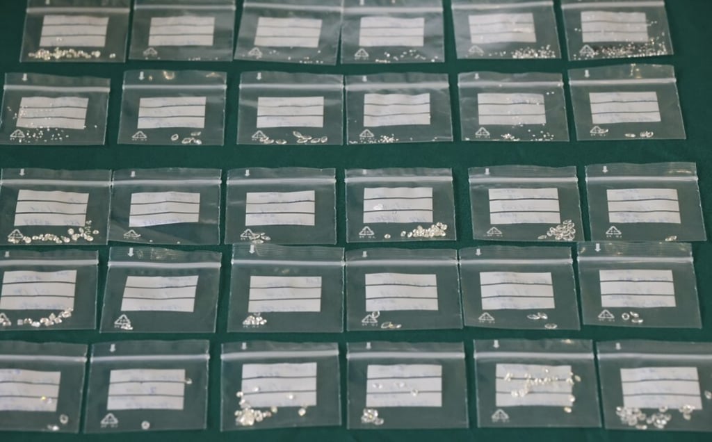 Customs seized 1,302 diamonds, along with 330 grams of melee diamonds, 10 blue diamonds and one emerald. Photo: Nora Tam