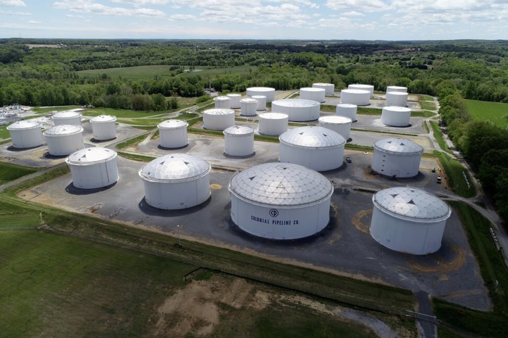 Holding tanks are seen in an aerial photograph at Colonial Pipeline's Dorsey Junction Station in Woodbine, Maryland, on May 10. Photo: Reuters Holding tanks are seen in an aerial photograph at Colonial Pipeline's Dorsey Junction Station in Woodbine, Maryland, on May 10. Photo: Reuters