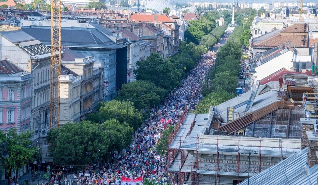 Demonstrators march towards the Hungarian Parliament in Budapest on Saturday. Photo: EPA-EFE Demonstrators march towards the Hungarian Parliament in Budapest on Saturday. Photo: EPA-EFE