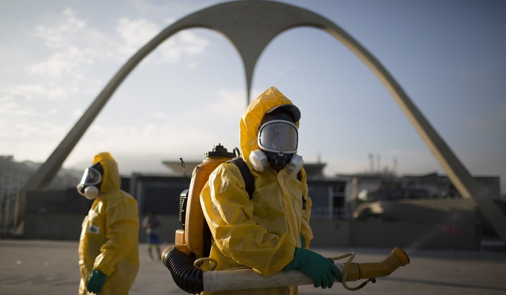 Health workers spray insecticide at an Olympics venue in Rio de Janeiro in 2016 to combat the mosquito-borne Zika virus. Photo: AP
