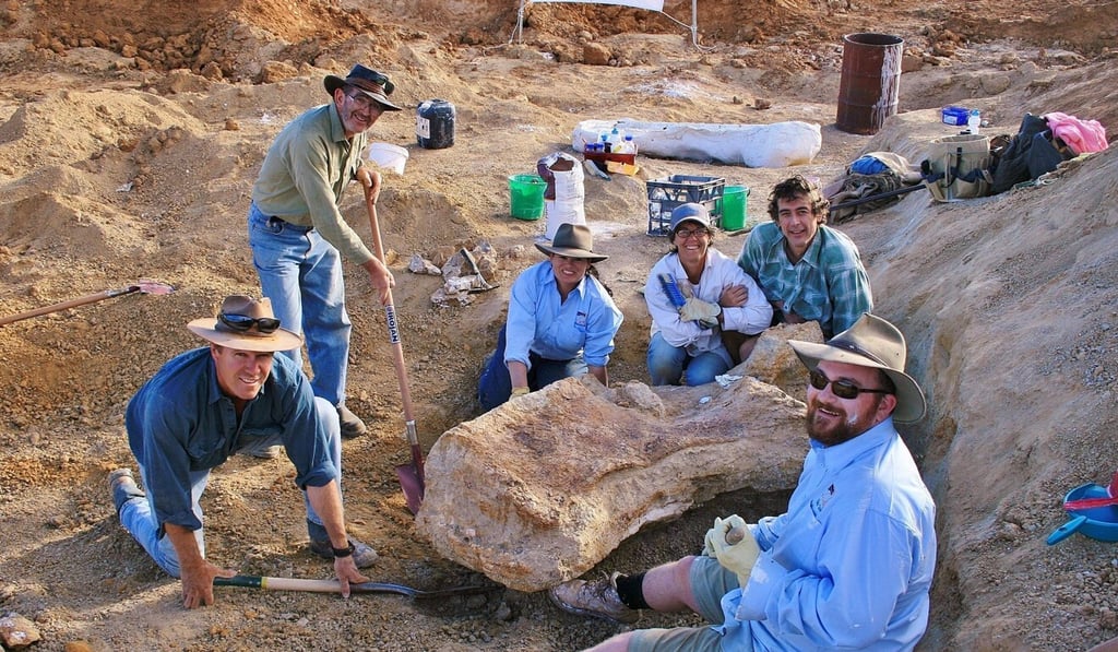 Researchers dig for dinosaur fossils in Cooper Creek, western Queensland, where the fossils were discovered in 2007. Photo: AFP