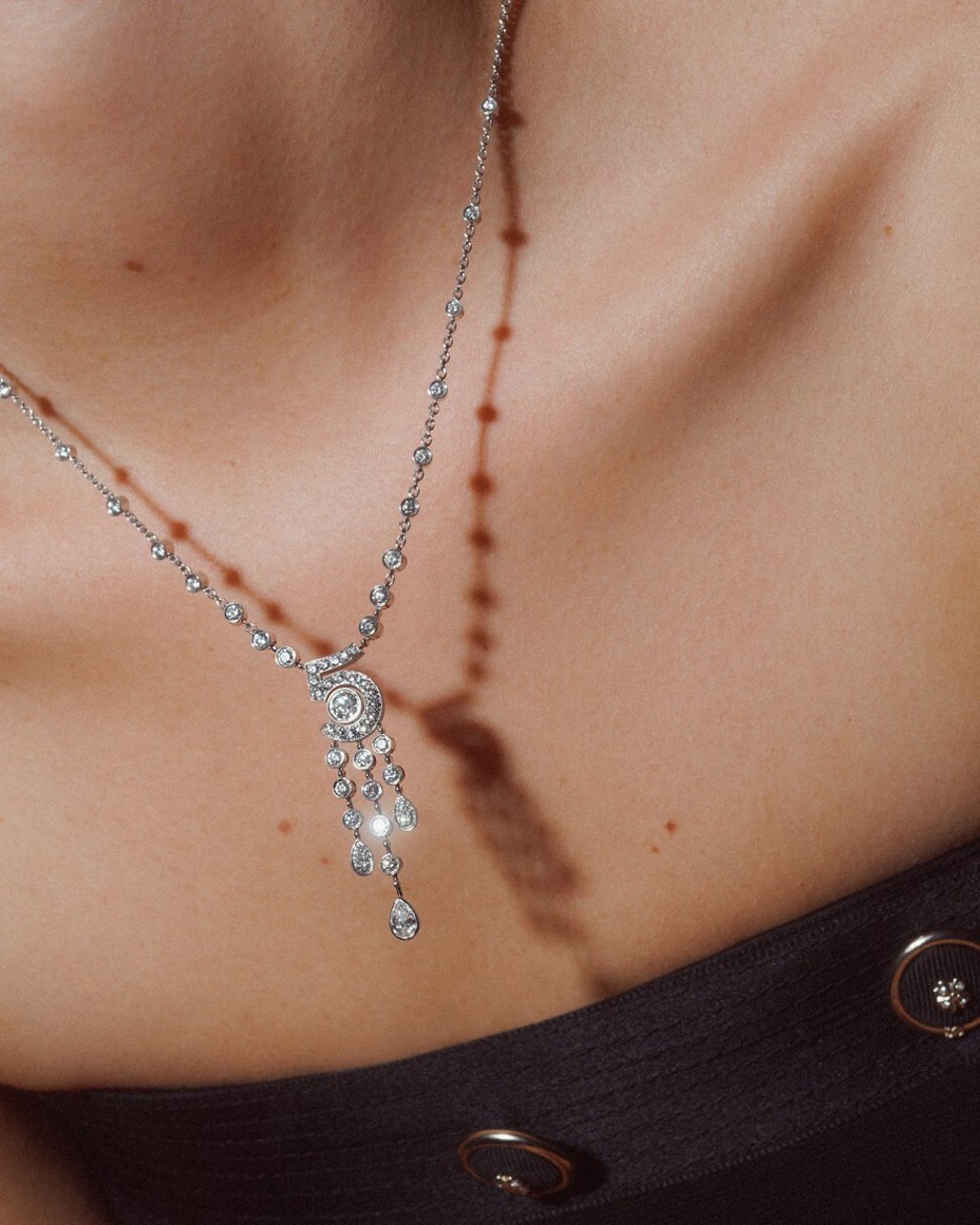 The Eternal N°5 necklace features a cascade of diamonds meant to evoke drops of Chanel N°5 perfume. Photo: Chanel