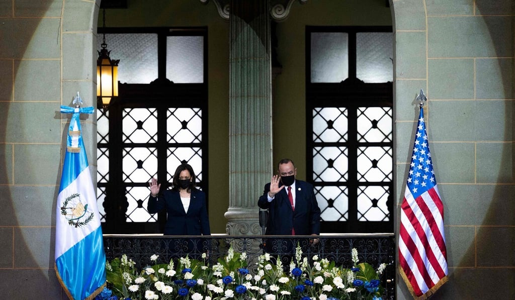 US Vice-President Kamala Harris and Guatemalan President Alejandro Giammattei wave at the Palacio Nacional de la Cultura in Guatemala City on Monday. Photo: AFP US Vice-President Kamala Harris and Guatemalan President Alejandro Giammattei wave at the Palacio Nacional de la Cultura in Guatemala City on Monday. Photo: AFP