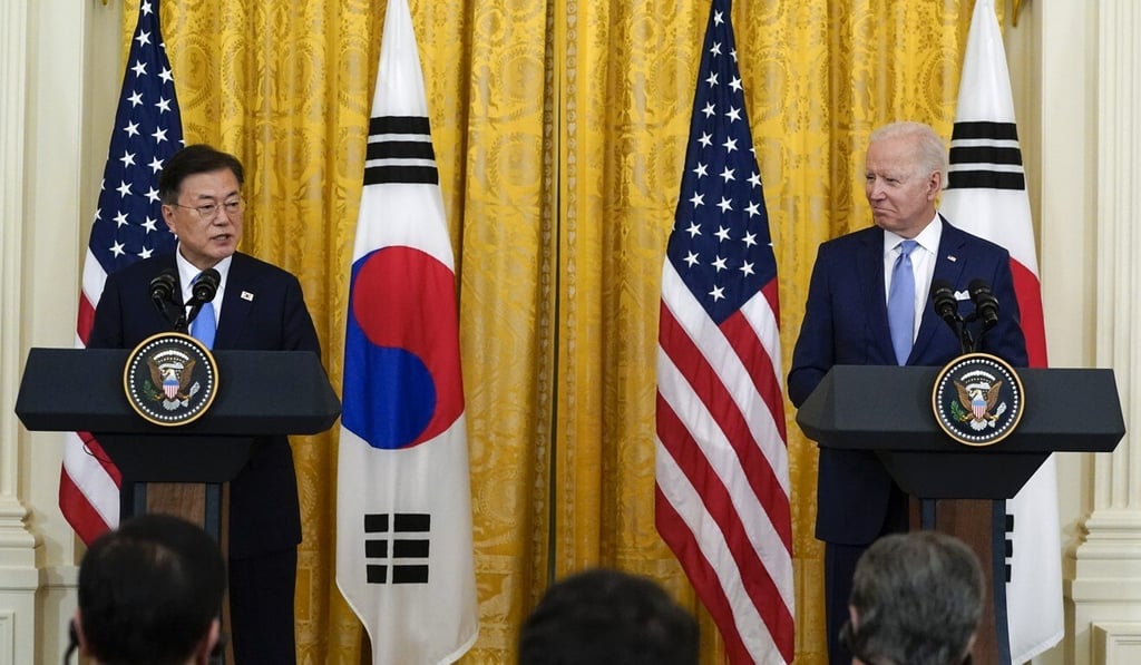 US President Joe Biden listens as South Korean President Moon Jae-in speaks during a joint news conference in the White House after their meeting last month. Photo: AP