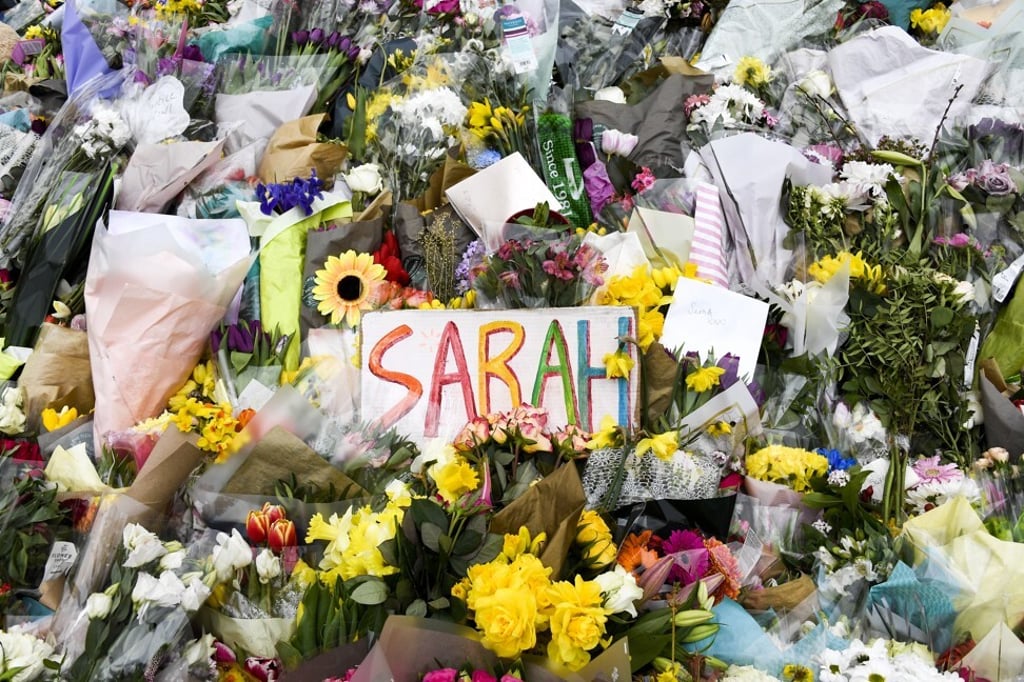 Floral tributes and messages to Sarah Everard are placed at the bandstand on Clapham Common in London. Photo: AP