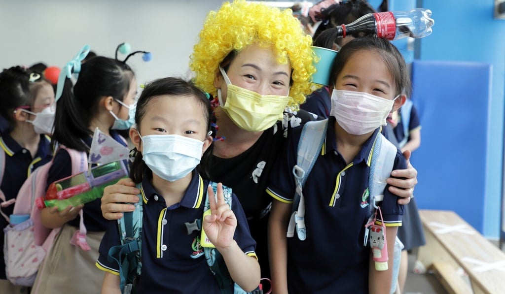 Dr Cora Hui (centre), head of school at CAPCL, in Hong Kong, says its use of English and Mandarin Chinese as the medium of instruction and holistic, play-based curriculum are among the reasons parents send their children to the school.