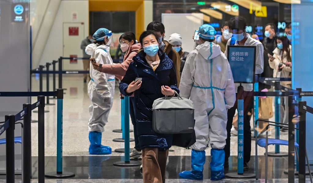 Passengers have their health code checked at the Tianhe International Airport in Wuhan. China led the global aviation recovery. Photo: AFP Passengers have their health code checked at the Tianhe International Airport in Wuhan. China led the global aviation recovery. Photo: AFP