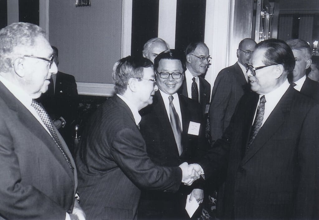Wang (second left) meets Jiang Zemin (right), then President of the People’s Republic of China, as Dr Henry Kissinger (left) looks on. Photo: Courtesy Chi Wang