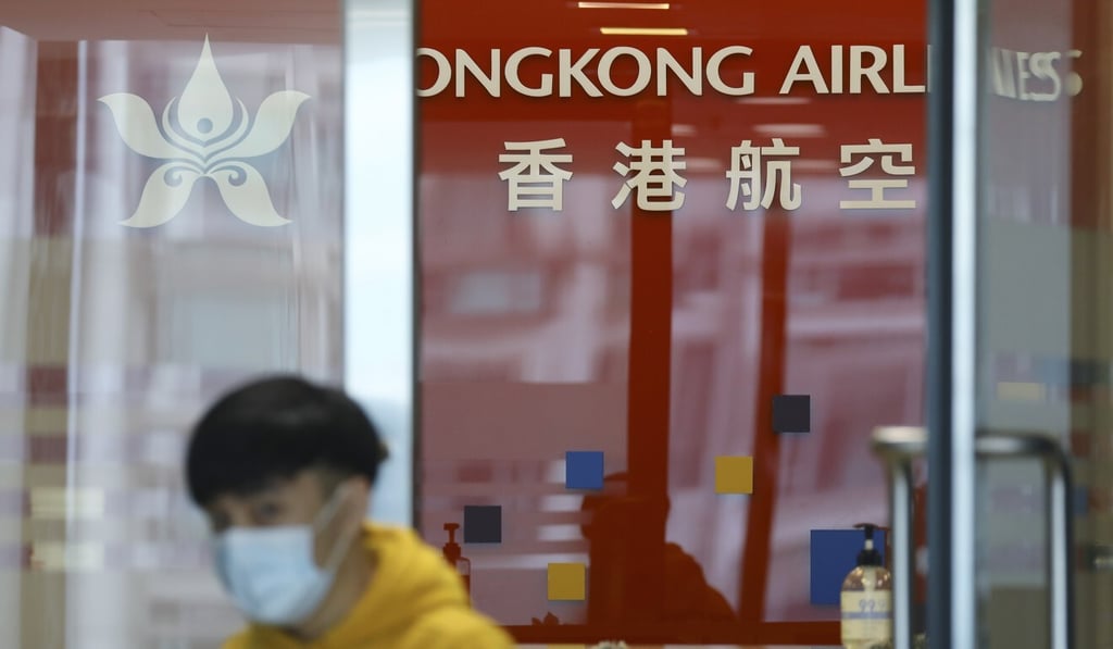 A man leaves the Hong Kong Airlines office at One Citygate in Tung Chung. Photo: Dickson Lee A man leaves the Hong Kong Airlines office at One Citygate in Tung Chung. Photo: Dickson Lee