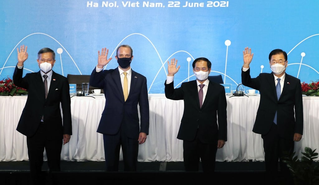 From left: Singapore Foreign Minister Vivian Balakrishnan, UK Foreign Secretary Dominic Raab, Vietnamese Foreign Minister Bui Thanh Son and South Korean Foreign Minister Chung Eui-yong in Hanoi, Vietnam on June 22, 2021. Photo: AP