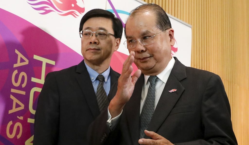 Hong Kong security chief John Lee (left) has been elevated to replace Matthew Cheung (right) as chief secretary, the city’s No 2 position. Photo: Nora Tam Hong Kong security chief John Lee (left) has been elevated to replace Matthew Cheung (right) as chief secretary, the city’s No 2 position. Photo: Nora Tam