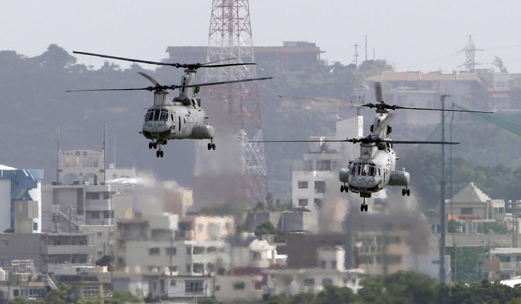 US military helicopters seen taking off from a Marine Corps base in Okinawa, Japan, in 2012. Photo: AP