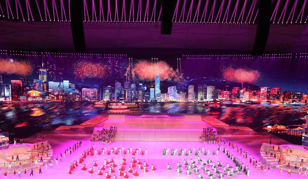 The handover of Hong Kong and Macau to mainland China is depicted in the “Great Journey”, a performance celebrating the centenary of the founding of the Communist Party of China at the National Stadium in Beijing. Photo: Simon Song