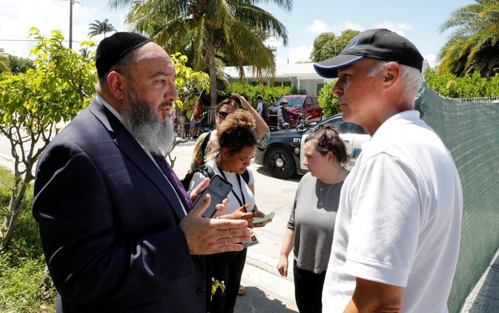 Rabbi Yosef Galimidi, left, and Surfside, Florida Mayor Charles Burkett. Photo: Reuters