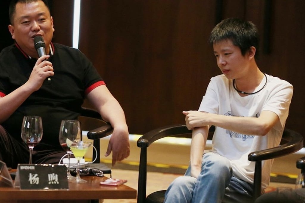Qingci Games chief executive Yang Xu, right, sits on a panel discussion with Leiting Games CEO Cui Jian in 2017. Photo: Handout