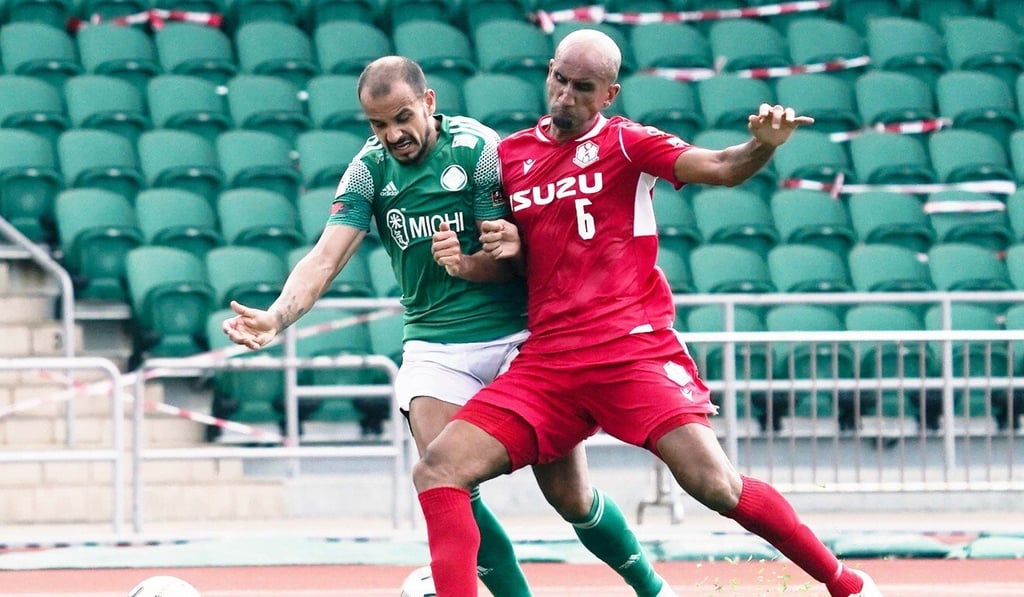 Southern’s Zesh Rehman battles with Happy Valley’s Mikael Severo in the Hong Kong Premier League. Photo: HKFA