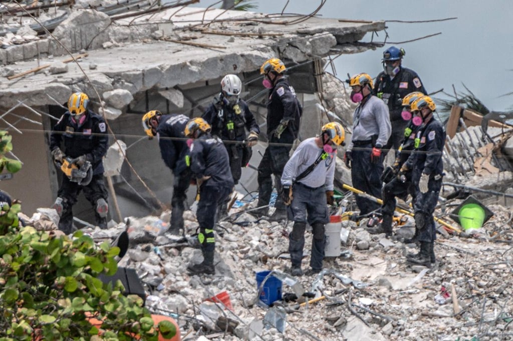 Rescuers search through fresh rubble. Photo: AFP