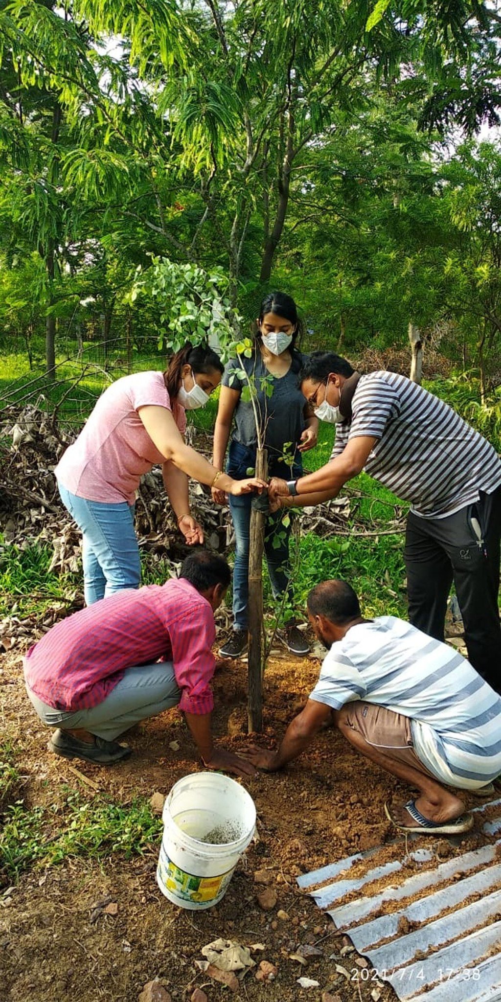 Volunteers plant a sapling at the memorial park near the Bhadbhada Vishram Ghat crematorium. Photo: Handout