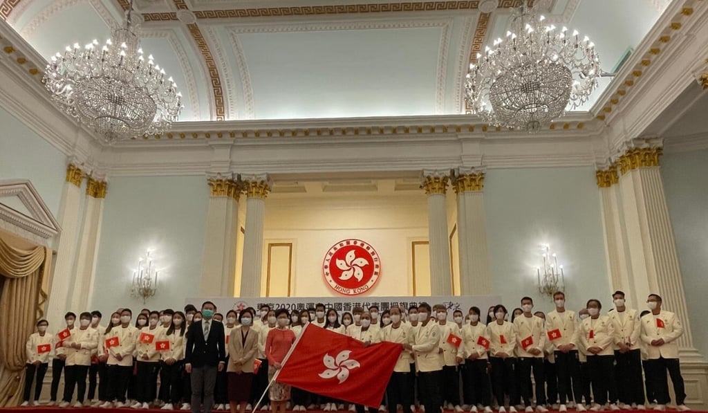 Chief Executive Carrie Lam Cheng Yuet-ngor presents the HKSAR flag to the Hong Kong delegation to the Tokyo Olympic Games. Photo: Hong Kong Olympic Committee Chief Executive Carrie Lam Cheng Yuet-ngor presents the HKSAR flag to the Hong Kong delegation to the Tokyo Olympic Games. Photo: Hong Kong Olympic Committee