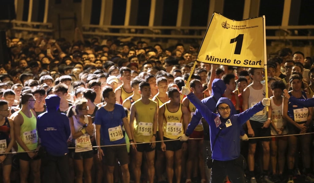 Runners wait at the start line on the Island Eastern Corridor during the 10km run of Standard Chartered Hong Kong Marathon in 2019. Photo: SCMP / Felix Wong