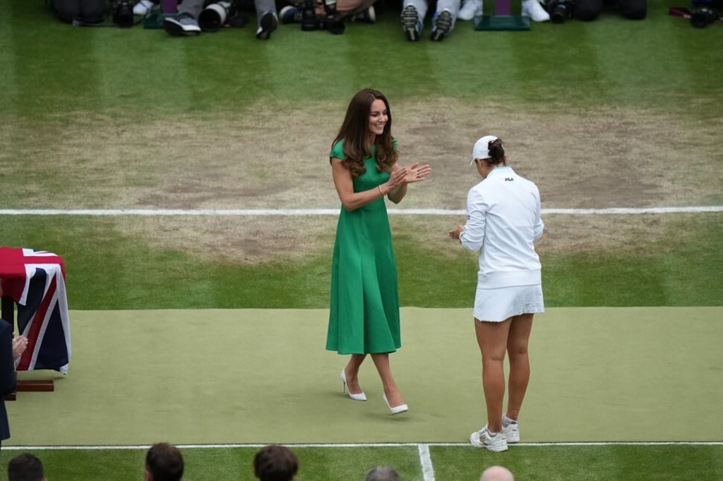 Kate, Duchess of Cambridge, applauds Australia’s Ashleigh Barty after she won the Wimbledon women’s singles final on Saturday. Photo: AP Kate, Duchess of Cambridge, applauds Australia’s Ashleigh Barty after she won the Wimbledon women’s singles final on Saturday. Photo: AP