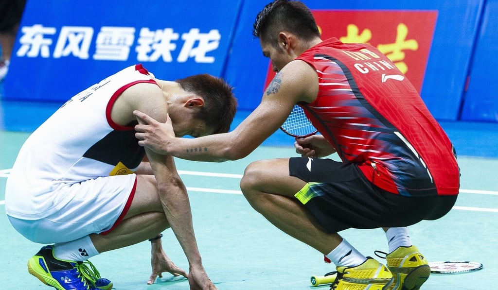 Malaysian badminton player Lee Chong Wei on his knees after getting an injury during the men's singles final match against Lin Dan of China at the BWF World Championships in Guangzhou, China in 2013. Photo: EPA Malaysian badminton player Lee Chong Wei on his knees after getting an injury during the men's singles final match against Lin Dan of China at the BWF World Championships in Guangzhou, China in 2013. Photo: EPA