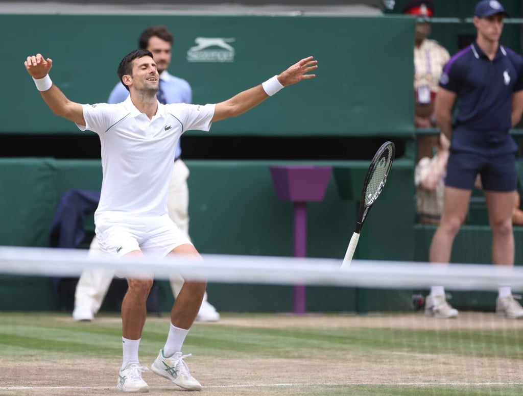 Novak Djokovic celebrates after winning the Wimbledon men’s final in London on Sunday. Photo: EPA-EFE