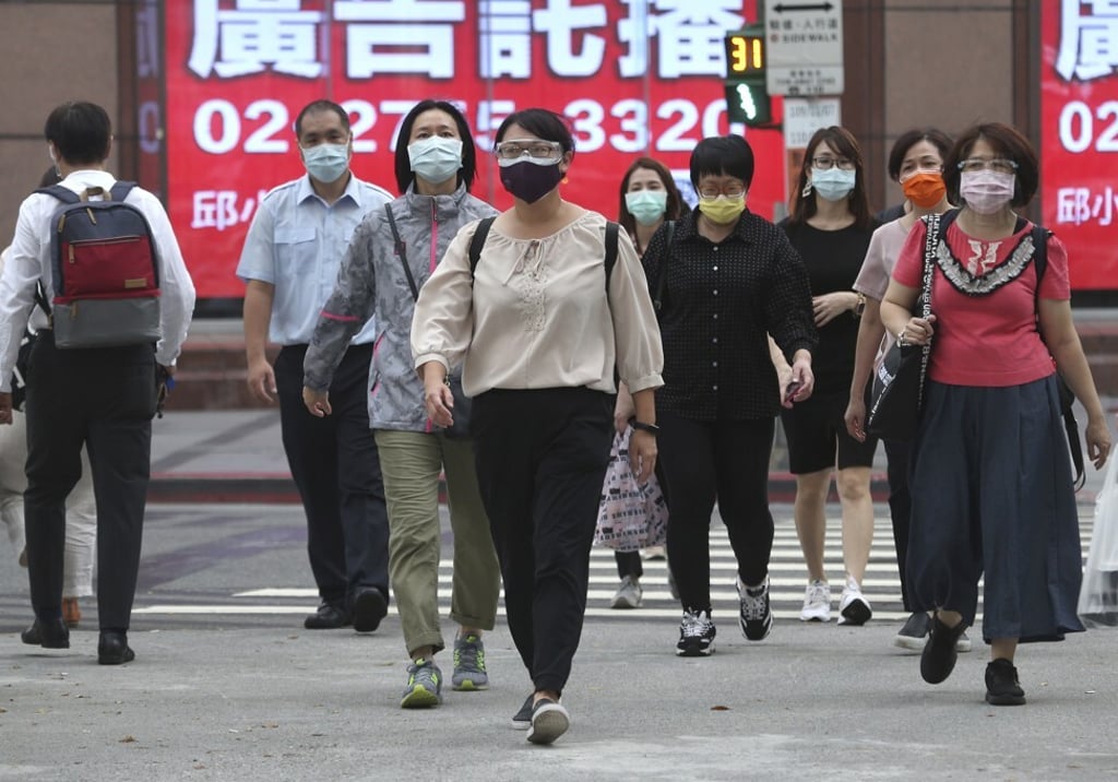 The coronavirus alert rose to level 3 in Taipei on Monday. Photo: AP
