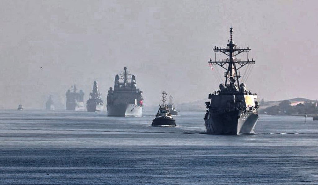Vessels of the UK Carrier Strike Group sail behind the HMS Queen Elizabeth through Egypt's Suez Canal earlier this month. Photo: AFP/Royal Navy/Crown Copyright