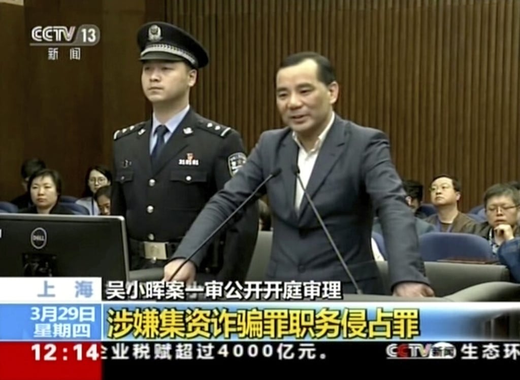 An undated video footage of Anbang Group’s founder and former chairman Wu Xiaohui, standing trial for fraud at the Shanghai No. 1 Intermediate People's Court. Photo: CCTV via AP Video
