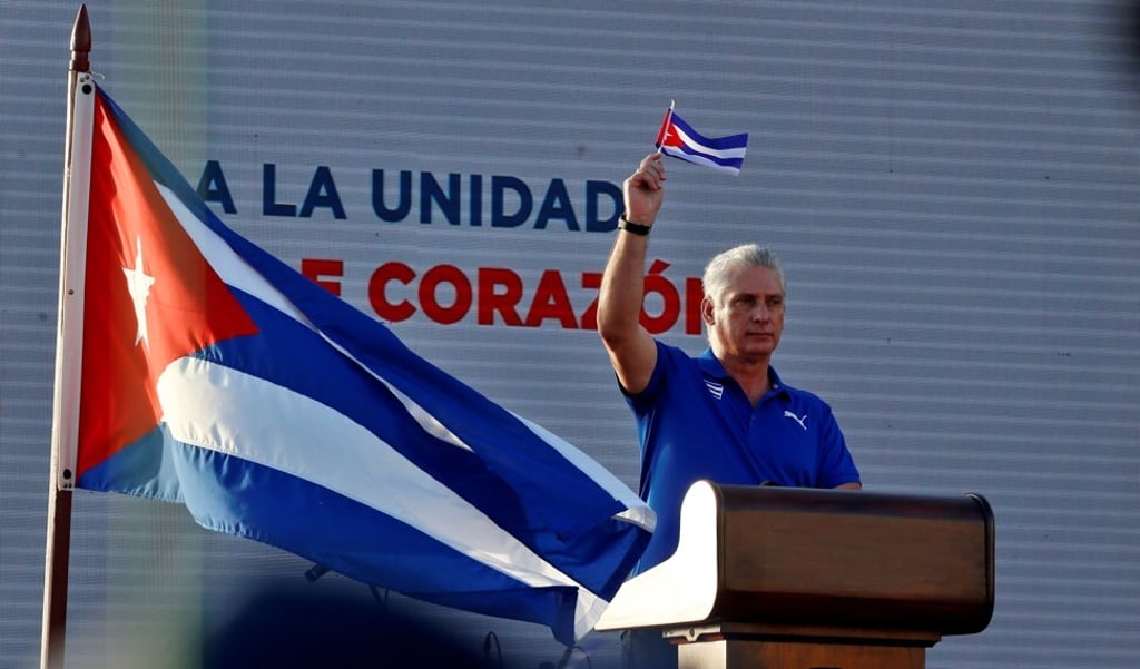 Cuba’s Miguel Diaz-Canel waves a Cuban flag during an event in support for the revolution in Havana, Cuba on Saturday. Photo: EPA-EFE