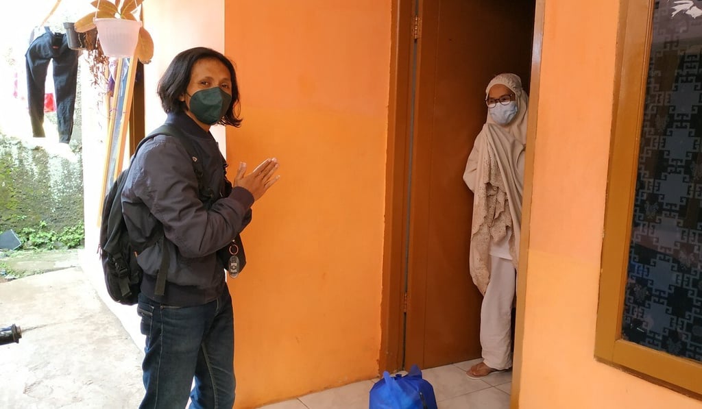 Wisnu Sopian travels around Cipanas every day to make much-needed deliveries to self-isolating Covid-19 patients. Photo: Handout