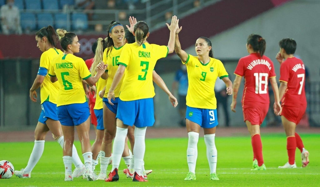 Brazil's players celebrate their win over China in the Tokyo 2020 Olympic Games opener. Photo: AFP Brazil's players celebrate their win over China in the Tokyo 2020 Olympic Games opener. Photo: AFP