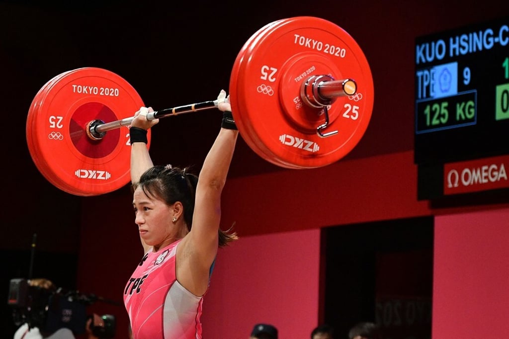 Kuo Hsing-chun competes in the women’s 59kg weightlifting competition. Photo: AFP
