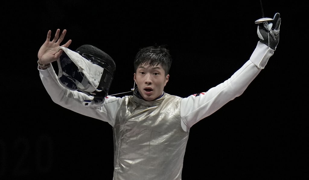 Cheung Ka-long celebrates after beating Daniele Garozzo of Italy. Photo: AP Cheung Ka-long celebrates after beating Daniele Garozzo of Italy. Photo: AP