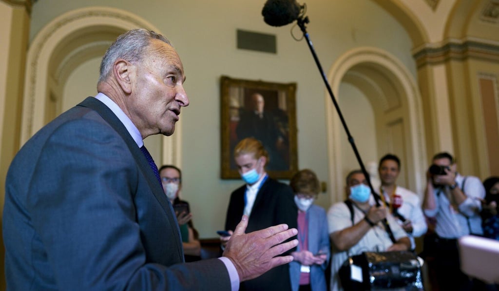 US Senate Majority Leader Chuck Schumer updates reporters on the infrastructure negotiations between Republicans and Democrats at the Capitol on Wednesday. Photo: AP