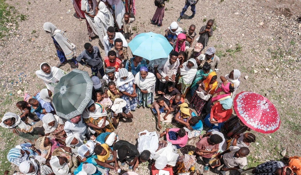 People wait to register for food distribution in Ethiopia’s Tigray region earlier this month. Photo: AFP