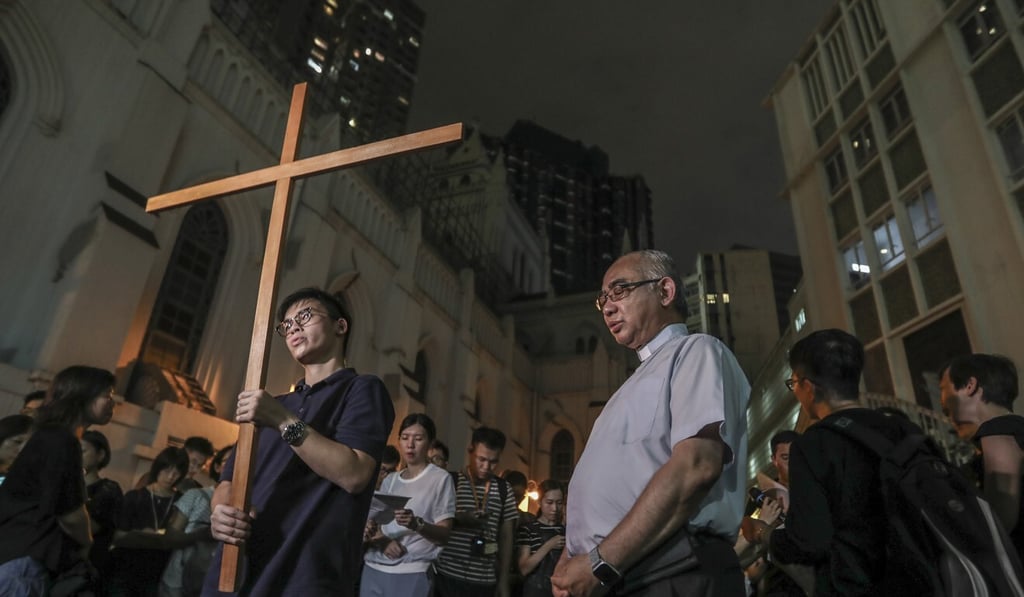 Catholic groups stage a candlelight march in 2019 calling for the withdrawal of an extradition bill that would have allowed defendants to be tried on the mainland. Photo: Xiaomei Chen Catholic groups stage a candlelight march in 2019 calling for the withdrawal of an extradition bill that would have allowed defendants to be tried on the mainland. Photo: Xiaomei Chen