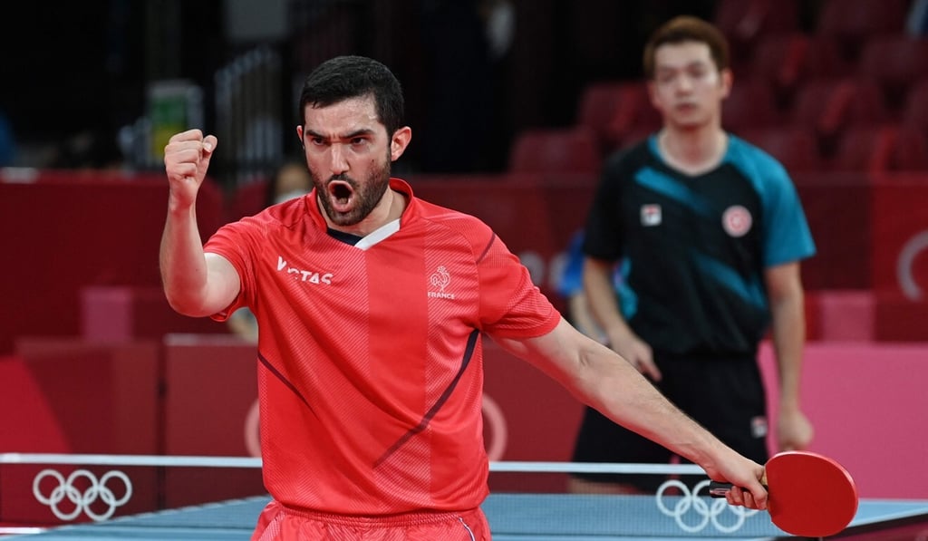 France's Emmanuel Lebesson celebrates a point against Hong Kong in the men’s team event. Photo: AFP