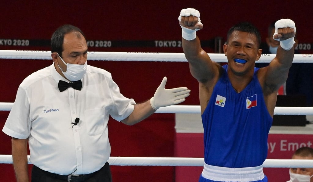 Eumir Marcial celebrates after winning his quarter-final contest against Armenia's Arman Darchinyan at the Tokyo Olympics. Photo: AFP