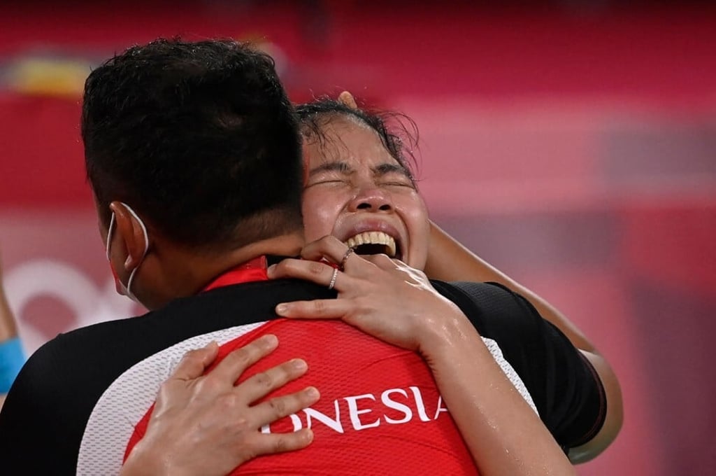 Indonesia’s Greysia Polii (right) is overcome with emotion after claiming badminton gold at Tokyo 2020. Photo: AFP Indonesia’s Greysia Polii (right) is overcome with emotion after claiming badminton gold at Tokyo 2020. Photo: AFP