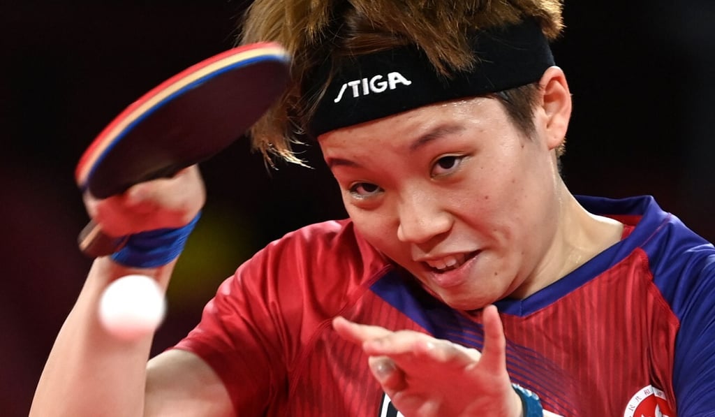Doo Hoi-kem fighting a losing battle against Japan’s Mima Ito during the team semi-final. Photo: AFP